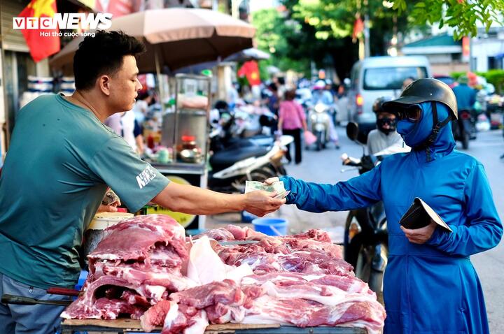 Giá thịt heo ngày Tết có tăng dựng ngược? - Ảnh 1.