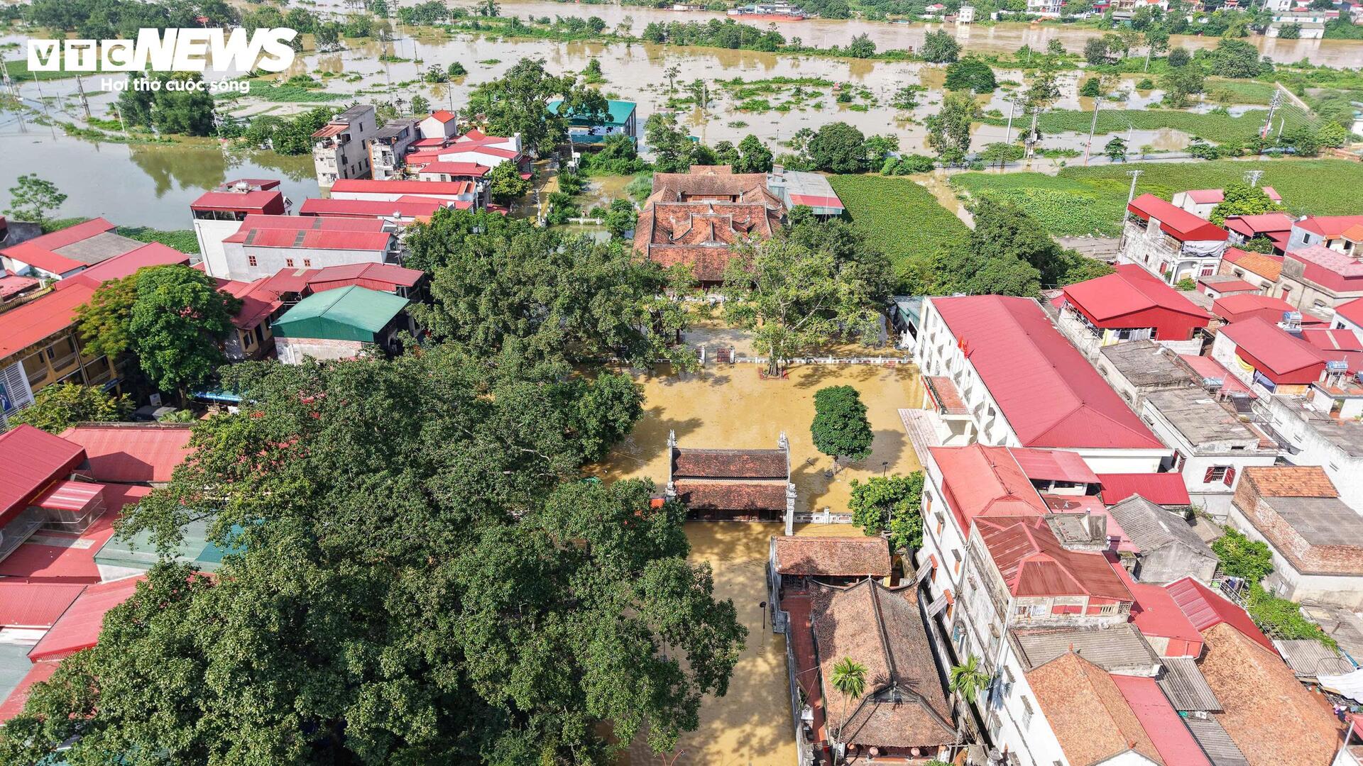 Lũ sông Cầu dâng cao, hơn 8.000 người dân ở Bắc Ninh bị cô lập - Ảnh 7. Lũ sông Cầu dâng cao, hơn 8.000 người dân ở Bắc Ninh bị cô lập - Ảnh 7.