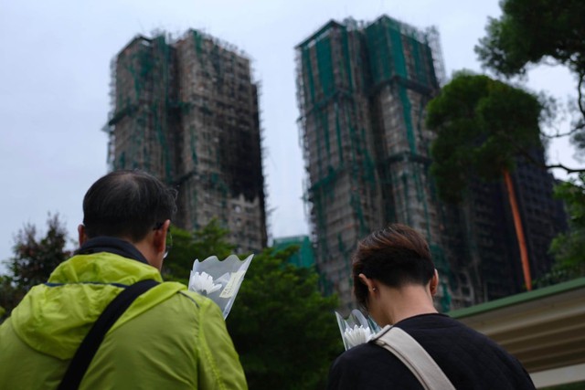 Hình ảnh đau thương tại Hong Kong sau vụ hỏa hoạn lịch sử 128 người thiệt mạng - Ảnh 4.