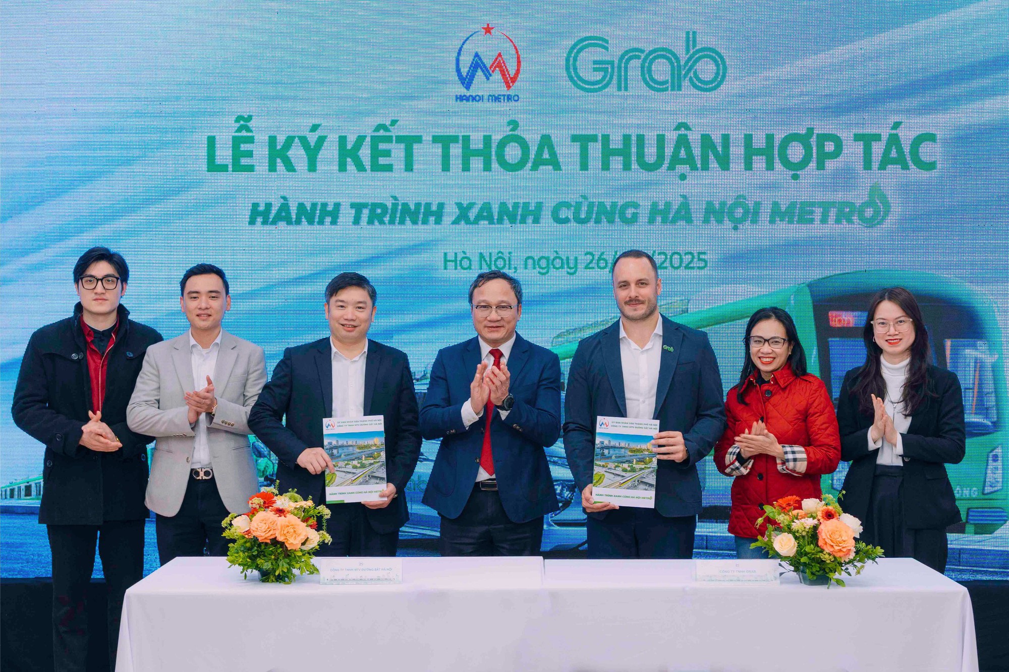 Metro Hà Nội và Grab Việt Nam ký kết thỏa thuận nhằm thúc đẩy sự phát triển của đường sắt đô thị Hà Nội- Ảnh 1.