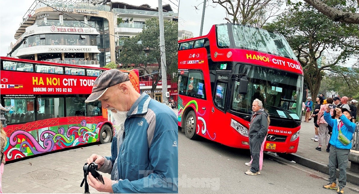 Hàng nghìn người đổ về tòa nhà Hàm cá mập check-in, CSGT phải cắm &quot;chốt&quot; đảm bảo giao thông - Ảnh 4.