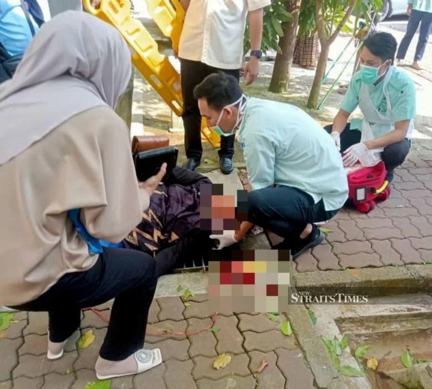 Đang đi tr&ecirc;n đường, người phụ nữ bị xe đạp từ tầng 12 rơi tr&uacute;ng đầu - Ảnh 1.