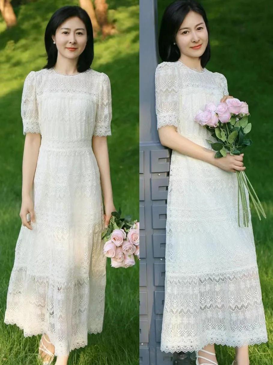 Phụ nữ tuổi 40 nhất định nên có “váy dài qua gối” trong tủ đồ mùa xuân hè - Ảnh 3.