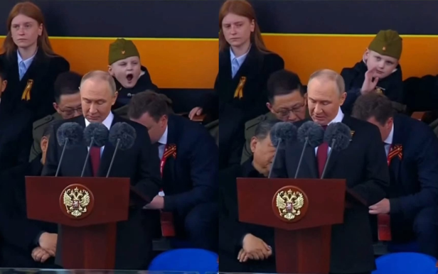 Vô tình lọt vào camera ngay thời khắc Tổng thống Putin phát biểu, cậu bé có biểu cảm khiến cả mạng xã hội chấn động - Ảnh 1. Vô tình lọt vào camera ngay thời khắc Tổng thống Putin phát biểu, cậu bé có biểu cảm khiến cả mạng xã hội chấn động - Ảnh 1.