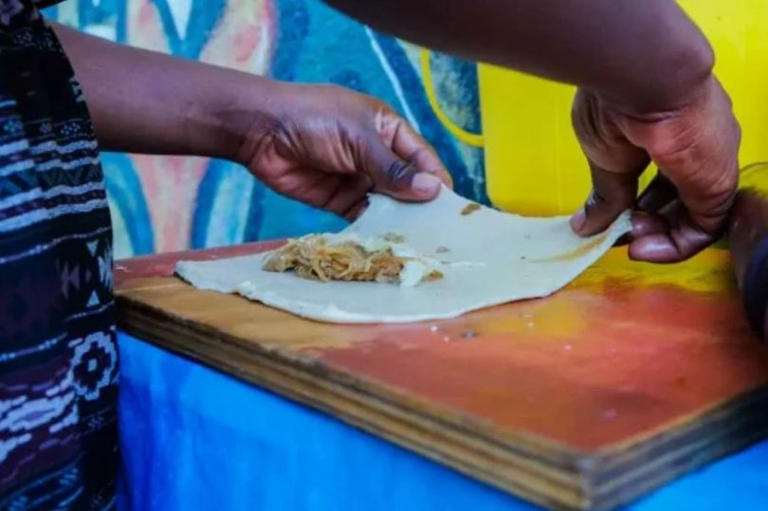 Người phụ nữ bán hàng rong ở Haiti đầu độc tử vong 40 thực khách vì lý do không tưởng - Ảnh 1. Người phụ nữ bán hàng rong ở Haiti đầu độc tử vong 40 thực khách vì lý do không tưởng - Ảnh 1.