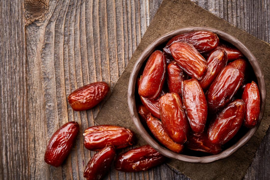 dry-dates-on-a-wooden-table-1748792762283-1748792762668300625212.jpg
