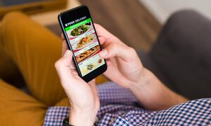 i-m-hungry-hands-man-looking-food-delivery-app-his-smartphone-ordering-dinner-online-1-1280x853-23371702-1755247651364-17552476514381467802207.jpg