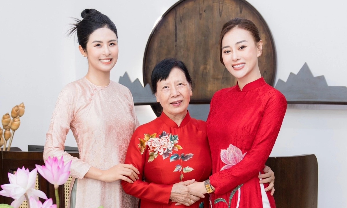 phuong-oanh-me-chong-ao-dai-ngoc-1754452611989368019320-1754465004943-17544650051222042141143.jpg