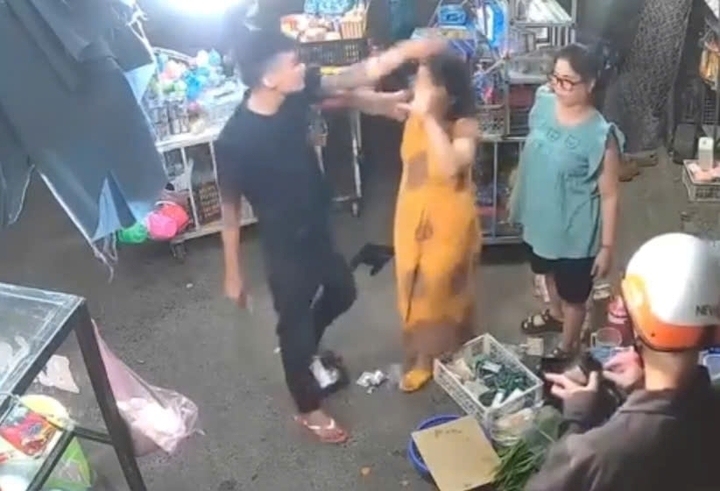 Công an triệu tập nam thanh niên đánh thai phụ và hỏi 'biết tao là ai không?' - Ảnh 3.