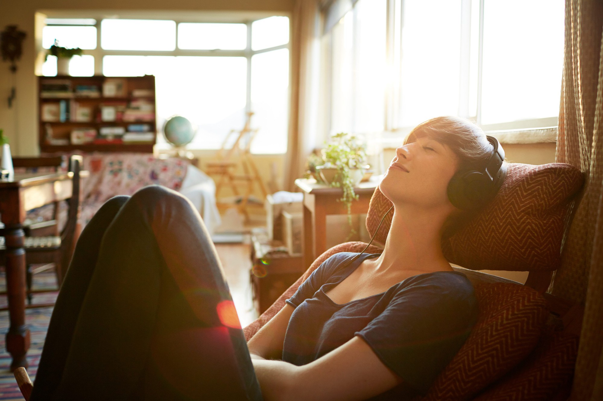young-woman-relaxing-with-headphones-at-home-royalty-free-image-1763099239-17694197309801154282098-1769428816075-17694288164951184082968.jpg