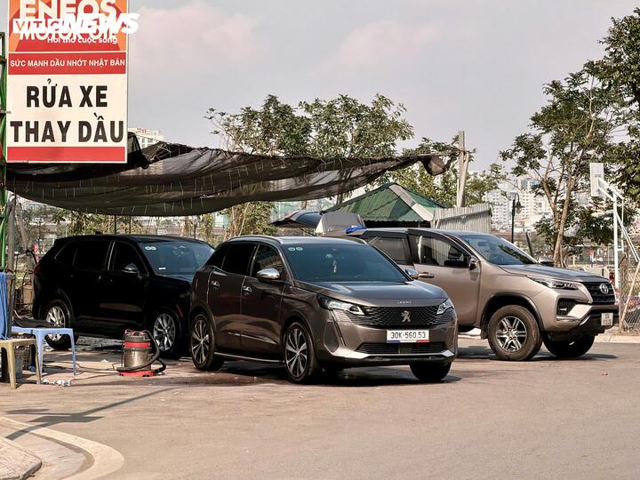 Tiệm rửa xe tại H&agrave; Nội tất bật kiếm 3-4 triệu ng&agrave;y 29 Tết - Ảnh 4.