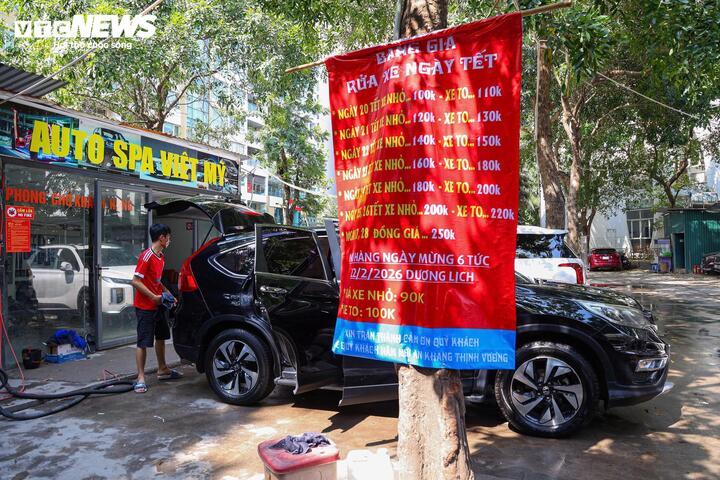 Tiệm rửa xe tại H&agrave; Nội tất bật kiếm 3-4 triệu ng&agrave;y 29 Tết - Ảnh 7.