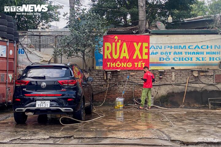 Tiệm rửa xe tại H&agrave; Nội tất bật kiếm 3-4 triệu ng&agrave;y 29 Tết - Ảnh 8.