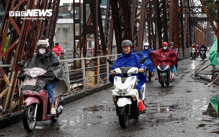 Dự b&aacute;o thời tiết ng&agrave;y 14/3/2026: Miền Bắc mưa ph&ugrave;n, miền Nam nắng n&oacute;ng - Ảnh 1.