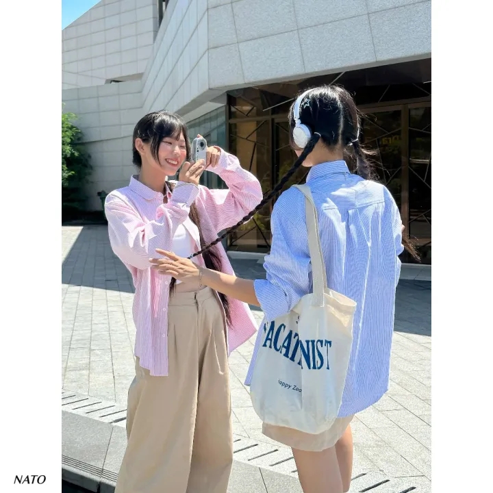 Chiếc &aacute;o kẻ sọc g&acirc;y b&atilde;o m&ugrave;a xu&acirc;n 2026: Phong c&aacute;ch thanh lịch cho mọi chị em - Ảnh 22.