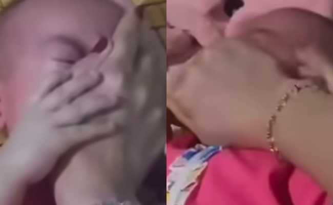 B&eacute; g&aacute;i bị mẹ b&oacute;p mũi v&agrave; miệng: Clip g&acirc;y phẫn nộ tr&ecirc;n mạng x&atilde; hội - Ảnh 1.