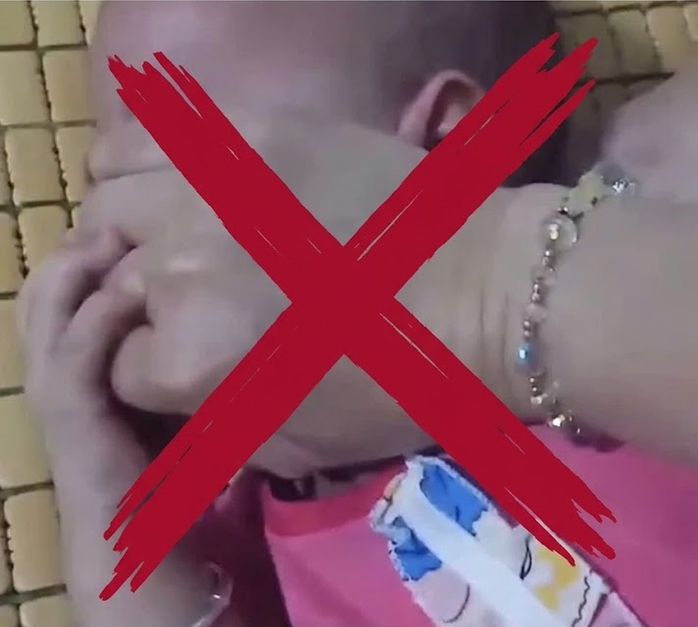 Cộng đồng mạng phẫn nộ về clip mẹ bịt miệng con g&aacute;i 1 tuổi tại Đắk Lắk - Ảnh 1.