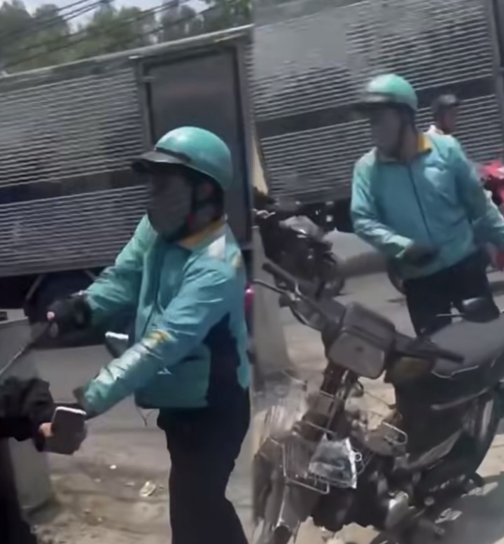 X&aacute;c minh clip t&agrave;i xế xe &ocirc;m c&ocirc;ng nghệ cầm hung kh&iacute; đ&aacute;nh người tại TP . HCM - Ảnh 1.