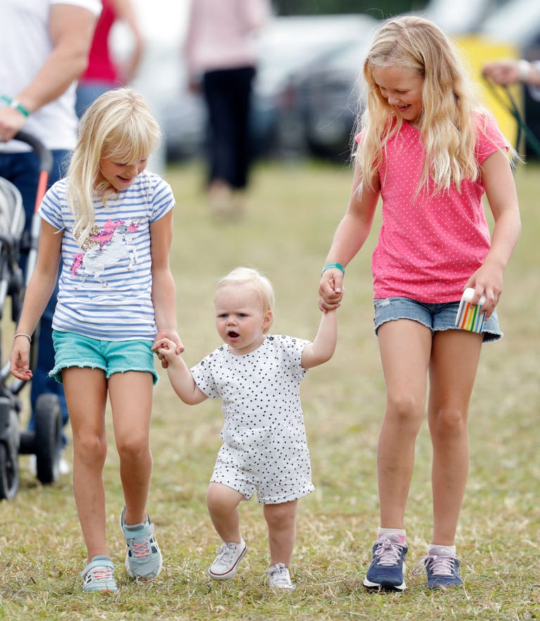 isla-phillips-and-savannah-phillips-walk-holding-hands-with-news-photo-1652210357-1776839057202177858813-1776885538685-17768855388412119475015.jpg