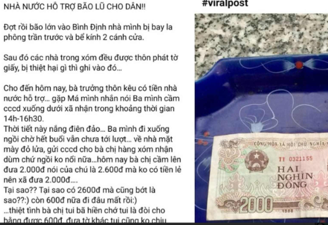 Người d&acirc;n phường B&igrave;nh Định chờ nhận tiền hỗ trợ b&atilde;o lũ sau nhiều giờ chờ đợi - Ảnh 1.