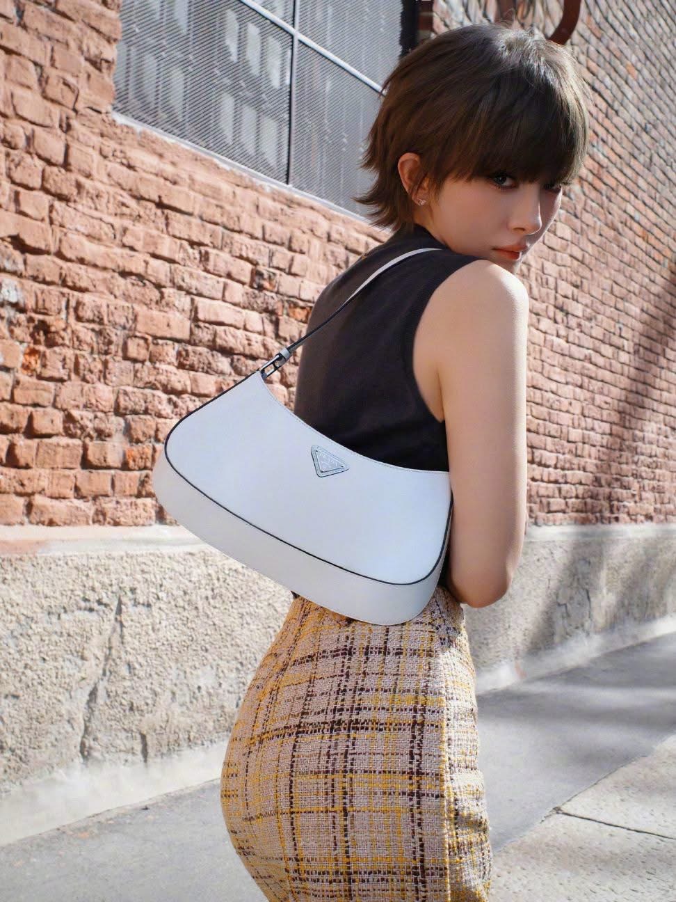 Dương Mịch nổi loạn với kiểu t&oacute;c ngắn ấn tượng tại show Prada 2026 - Ảnh 5.