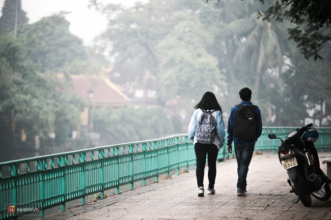 Ch&ugrave;m ảnh: H&agrave; Nội ng&agrave;y m&ugrave; sương - Ảnh 6.
