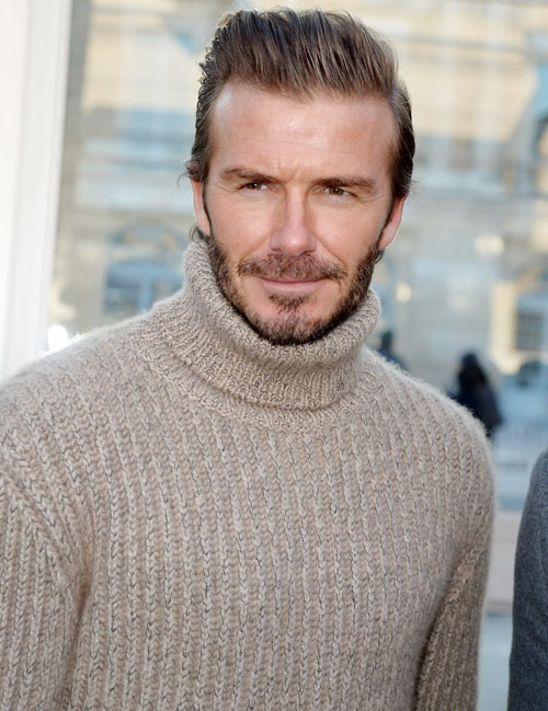 Hai biểu cảm đối lập của David Beckham khi ở bên cạnh bà xã Victoria - Ảnh 4.