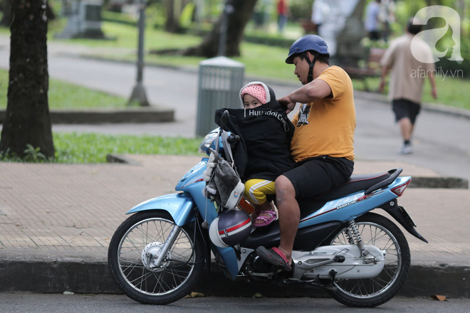 Trời đột ngột chuyển lạnh trở lại, người Sài Gòn co ro trong gió bão - Ảnh 8.