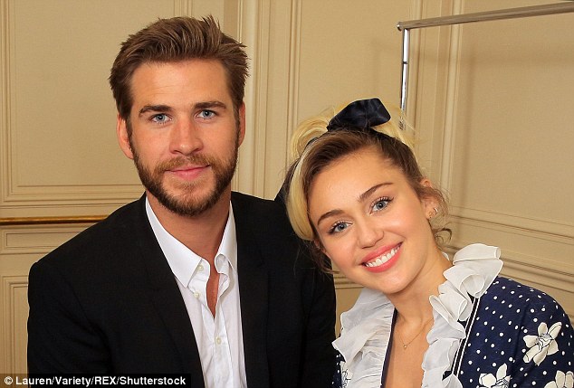 Rộ tin Miley Cyrus và Liam Hemsworth muốn nhận con nuôi sau khi kết hôn  - Ảnh 1.