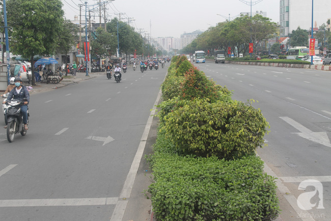 Hình ảnh giao thông Hà Nội, Sài Gòn thông thoáng trong buổi sáng ngày đầu tiên đi làm sau Tết - Ảnh 11.