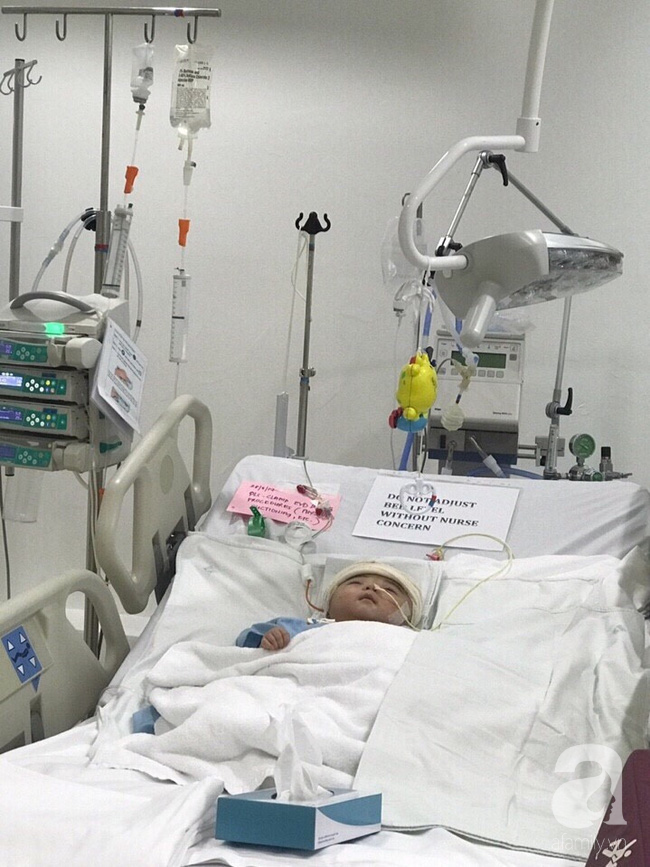 Một ngày sau cuộc tiểu phẫu, em bé não úng thuỷ Phạm Đức Lộc đã biết mở mắt, cử động tay chân - Ảnh 5.