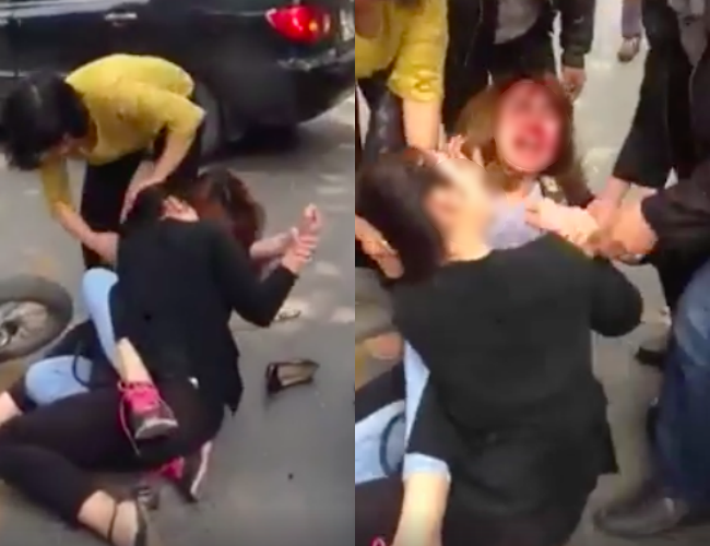 Sau va chạm giao thông, hai cô gái lao vào túm tóc, giằng co giữa phố Hà Nội - Ảnh 1.