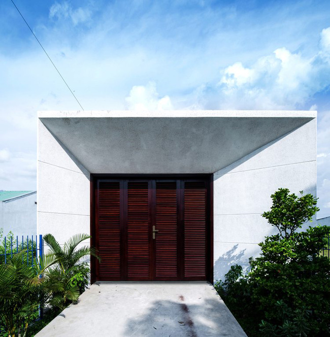 Ngôi nhà 200m² lấy cảm hứng thiết kế từ hang Sơn Đoòng ở Vĩnh Long nổi bật trên báo Mỹ - Ảnh 1.