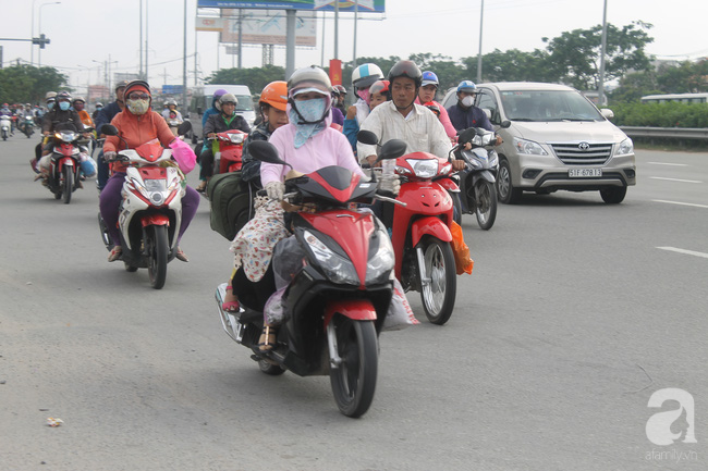 Hình ảnh giao thông Hà Nội, Sài Gòn thông thoáng trong buổi sáng ngày đầu tiên đi làm sau Tết - Ảnh 22.