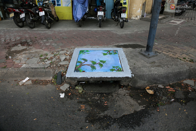 Nhìn những bức tranh trên nắp cống ở Sài Gòn đẹp như thế này, không ai nỡ xả rác nữa! - Ảnh 14.