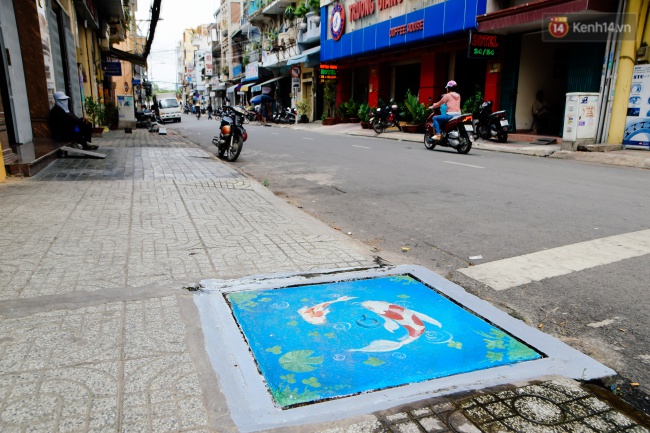 Nhìn những bức tranh trên nắp cống ở Sài Gòn đẹp như thế này, không ai nỡ xả rác nữa! - Ảnh 17.
