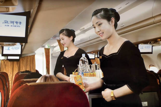 Tiếp viên hàng không Triều Tiên xinh như mộng - Ảnh 3.