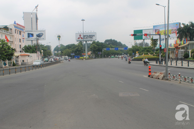 Hình ảnh giao thông Hà Nội, Sài Gòn thông thoáng trong buổi sáng ngày đầu tiên đi làm sau Tết - Ảnh 13.
