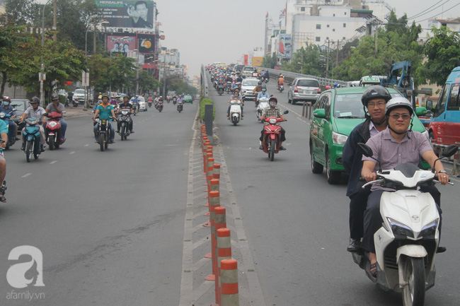 Hình ảnh giao thông Hà Nội, Sài Gòn thông thoáng trong buổi sáng ngày đầu tiên đi làm sau Tết - Ảnh 16.