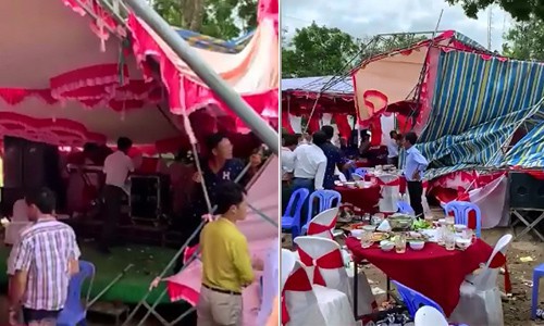 Clip: Bão số 9 kèm gió lớn cuốn phăng rạp cưới ở Bình Thuận, 300 quan khách đang dự tiệc bỏ chạy tán loạn - Ảnh 2.