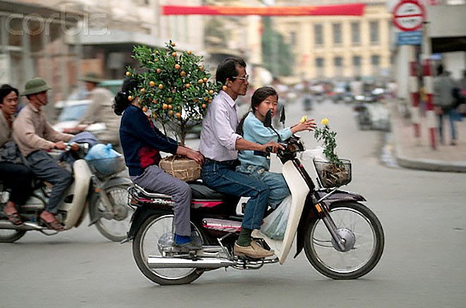 Trọn vẹn bộ ảnh duy nhất trên đời tái hiện lại Tết xưa độc đáo và mới lạ từ đầu thế kỷ XX đến những năm 90 - Ảnh 10.