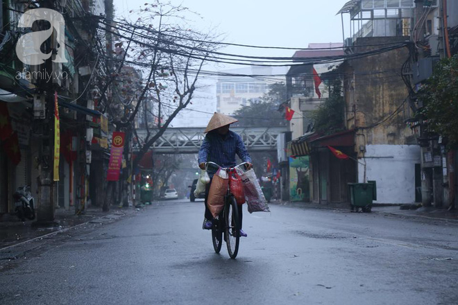 Sáng mùng 1 năm nào Hà Nội cũng vắng vẻ thanh bình, nhưng ngắm mãi vẫn thấy yêu đến lạ - Ảnh 8.