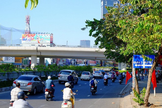 Ngày đi làm đầu tiên năm 2018: Sài Gòn nắng đẹp thông thoáng, Hà Nội mưa phùn ùn ứ nhẹ - Ảnh 4.