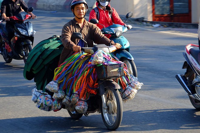 Ngày đi làm đầu tiên năm 2018: Sài Gòn nắng đẹp thông thoáng, Hà Nội mưa phùn ùn ứ nhẹ - Ảnh 8.