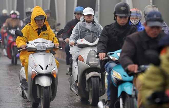 Đêm nay không khí lạnh tràn xuống Bắc Bộ, Hà Nội mưa rào và dông, vùng núi cao có nơi rét dưới 12 độ - Ảnh 1.