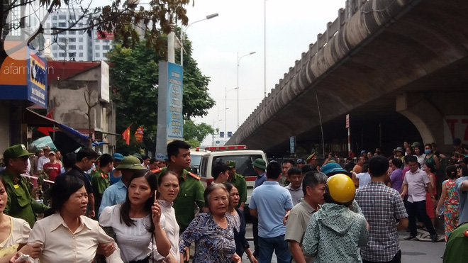 Gặp đôi vợ chồng dùng thang cứu 6 người trong vụ cháy ở Long Biên, Hà Nội - Ảnh 2.