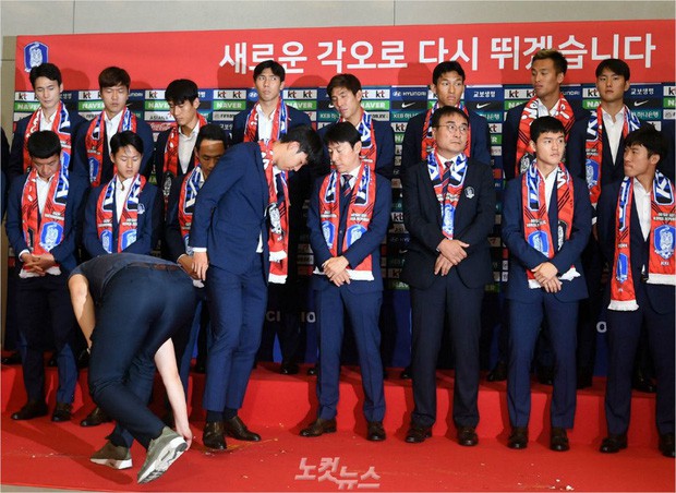 Son Heung-min bị CĐV Hàn Quốc ném trứng sau khi trở về nước từ World Cup 2018 - Ảnh 2.