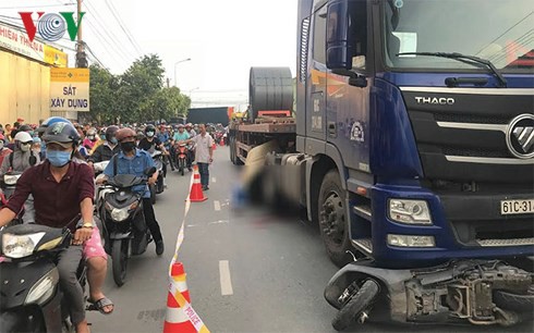 Thai nhi văng khỏi bụng mẹ khi bị container cán qua người đã tử vong - Ảnh 1.