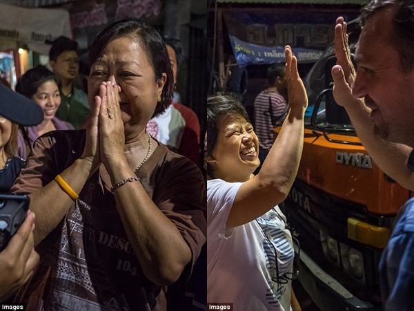 Người Thái Lan vỡ òa hạnh phúc, mở tiệc xuyên đêm sau khi đội bóng nhí được giải cứu - Ảnh 8.