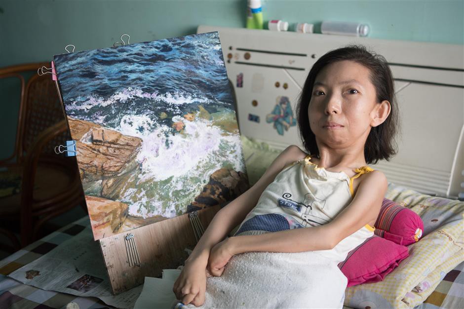 Trung Quốc: Người phụ nữ tật nguyền 30 năm kiếm sống bằng hội họa - Ảnh 3.